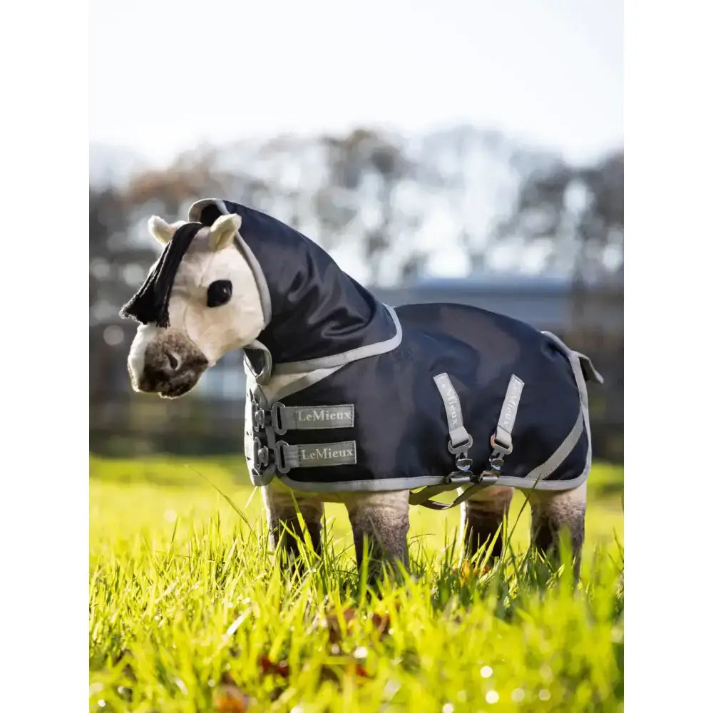 Lemieux toy pony navy turnout rug with silver reflective trim and adjustable straps for secure fit