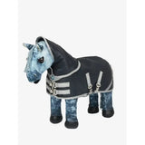 A plush lemieux toy pony wearing a navy storm-tek turnout rug with black silver and reflective straps
