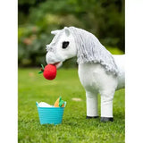 White plush lemieux toy pony with gray fringed mane holding red apple pony treat bucket multi for treats