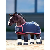 A plush brown lemieux toy pony wearing a navy blue pony winners rug with red trim and a union jack patch on the chest