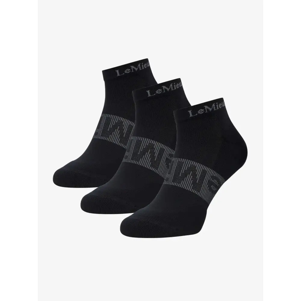 Black lemieux trainer socks with gray geometric pattern and silver logo on cuff perfect for trainers