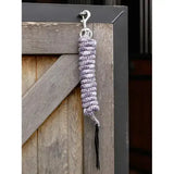 A coiled silver and black patterned lemieux training leadrope dusk peony with metal clip for easy handling