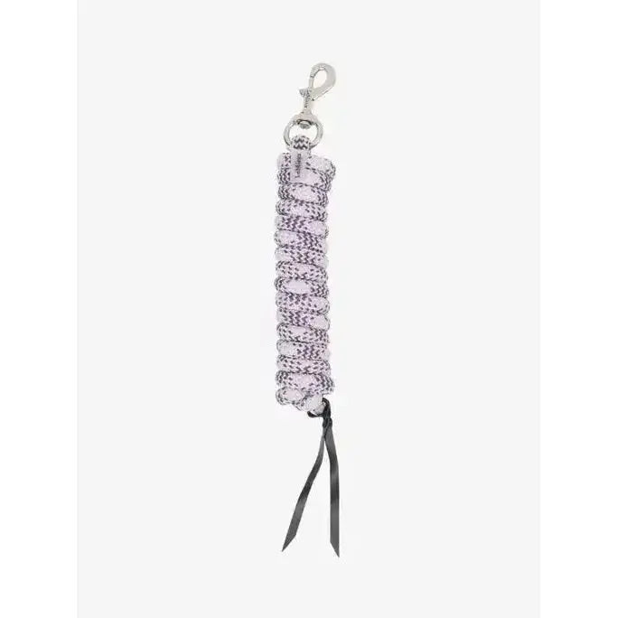 A delicate lavender and white woven lemieux training leadrope dusk peony with silver clasp and black ribbon tassels