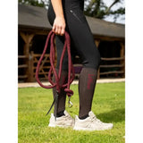 A thick braided maroon lemieux training leadrope ember with a metal hook and black strap for long training use