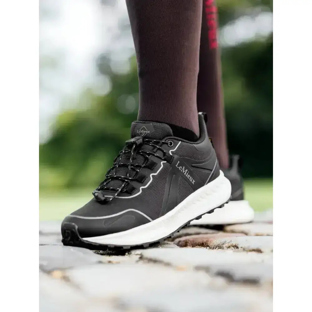 Lemieux trax 2.0 waterproof trainers black with white accents and textured rubber sole for trax sport use
