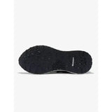 Black rubber sole with textured tread and michelin logo on the heel of lemieux trax 2.0 waterproof trainers cinder