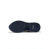 Black rubber sole of lemieux trax 2.0 waterproof trainers petrol with textured tread and michelin logo side view