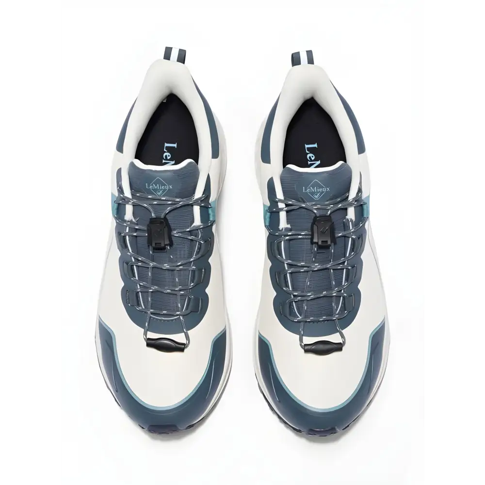 Pair of Lemieux Trax 2.0 waterproof trainers petrol ecru in white and blue-gray colors