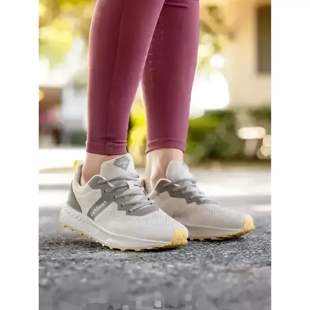 Light gray and beige le mieux trax-lite trainer pecan with breathable mesh upper and gum sole perfect for equestrian use