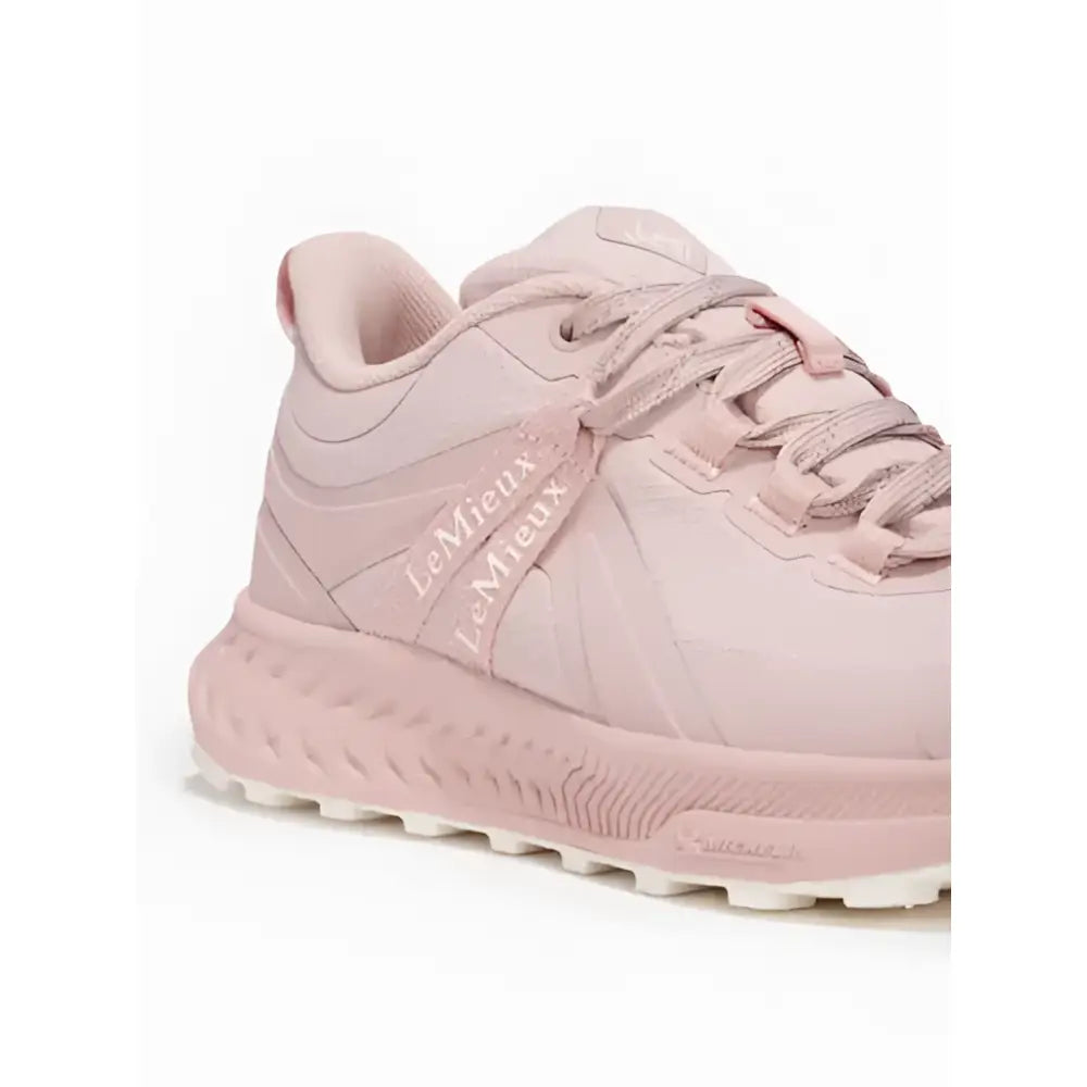 A soft pink lemieux trax viva waterproof trainer blossom sneaker with textured upper and matching laces