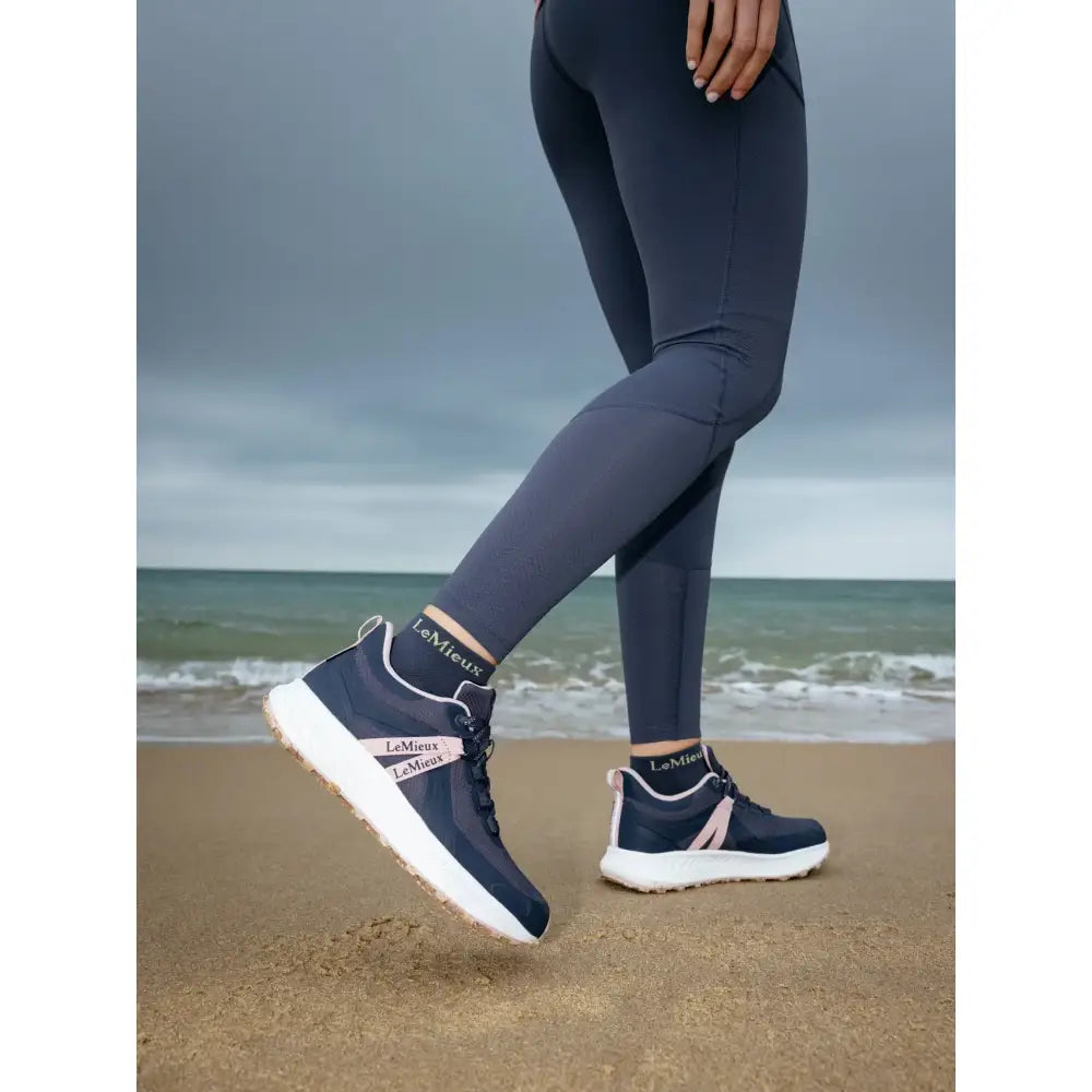 Navy blue and white lemieux trax viva waterproof trainer dusk with pink accents and lemieux branding on the side and tongue