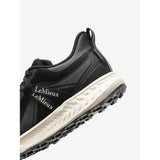 Black lemieux trax waterproof trainer with glossy finish and white midsole featuring lemieux branding on the side