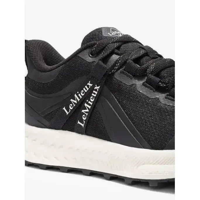 Lemieux trax waterproof trainer in black with textured mesh upper white midsole and black laces for running