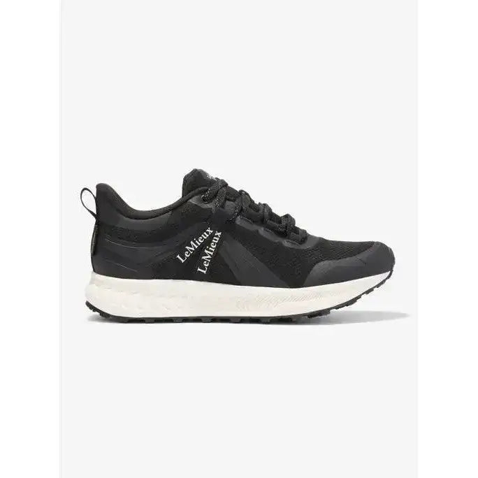 Black lemieux trax waterproof trainer with white midsole and textured rubber outsole for outdoor running