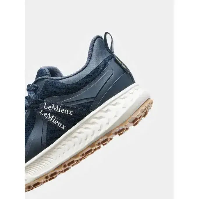 Dark navy lemieux trax waterproof trainer with black mesh upper white midsole and tan outsole all-terrain waterproof trainer navy