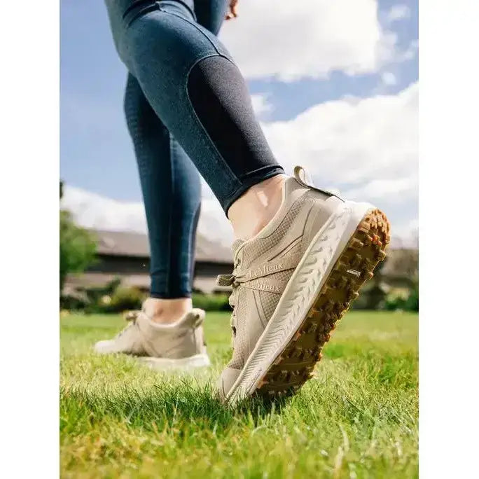 Beige lemieux trax waterproof trainer with textured mesh upper and rugged earth toned rubber outsole for trail runs
