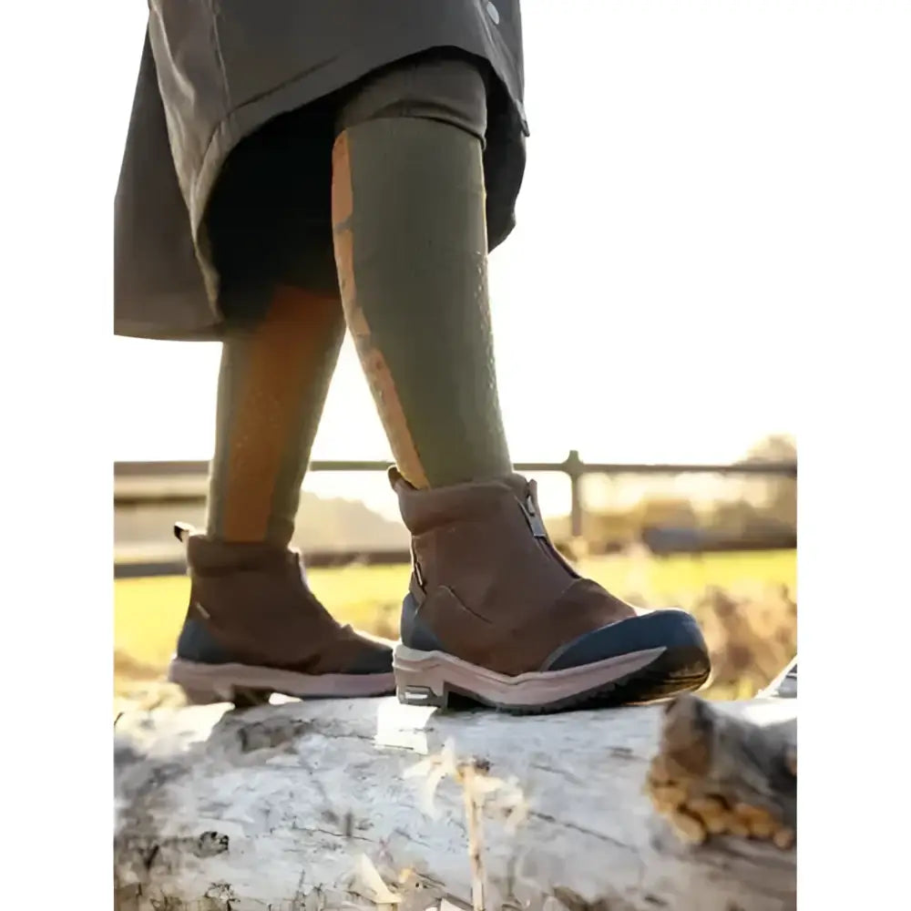 Brown and navy lemieux traxion zip boots with waterproof rugged design and stirrup-friendly heel perfect for hiking