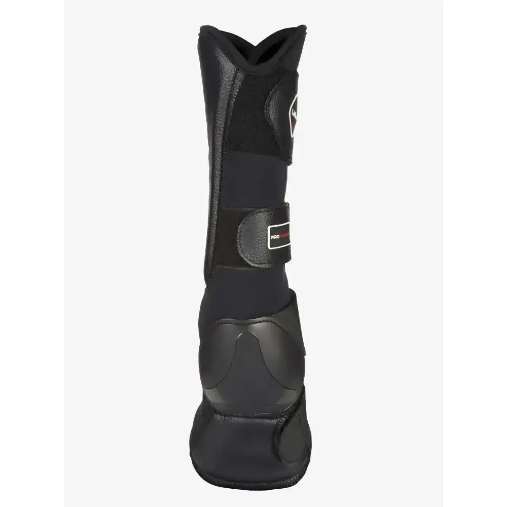 Black lemieux turnout boots with padded antibacterial ventilated neoprene and velcro strap featuring subtle logo on side