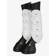 White leather lemieux ultra mesh snug boots hind with black rubber tips and silver logo patches on horse legs