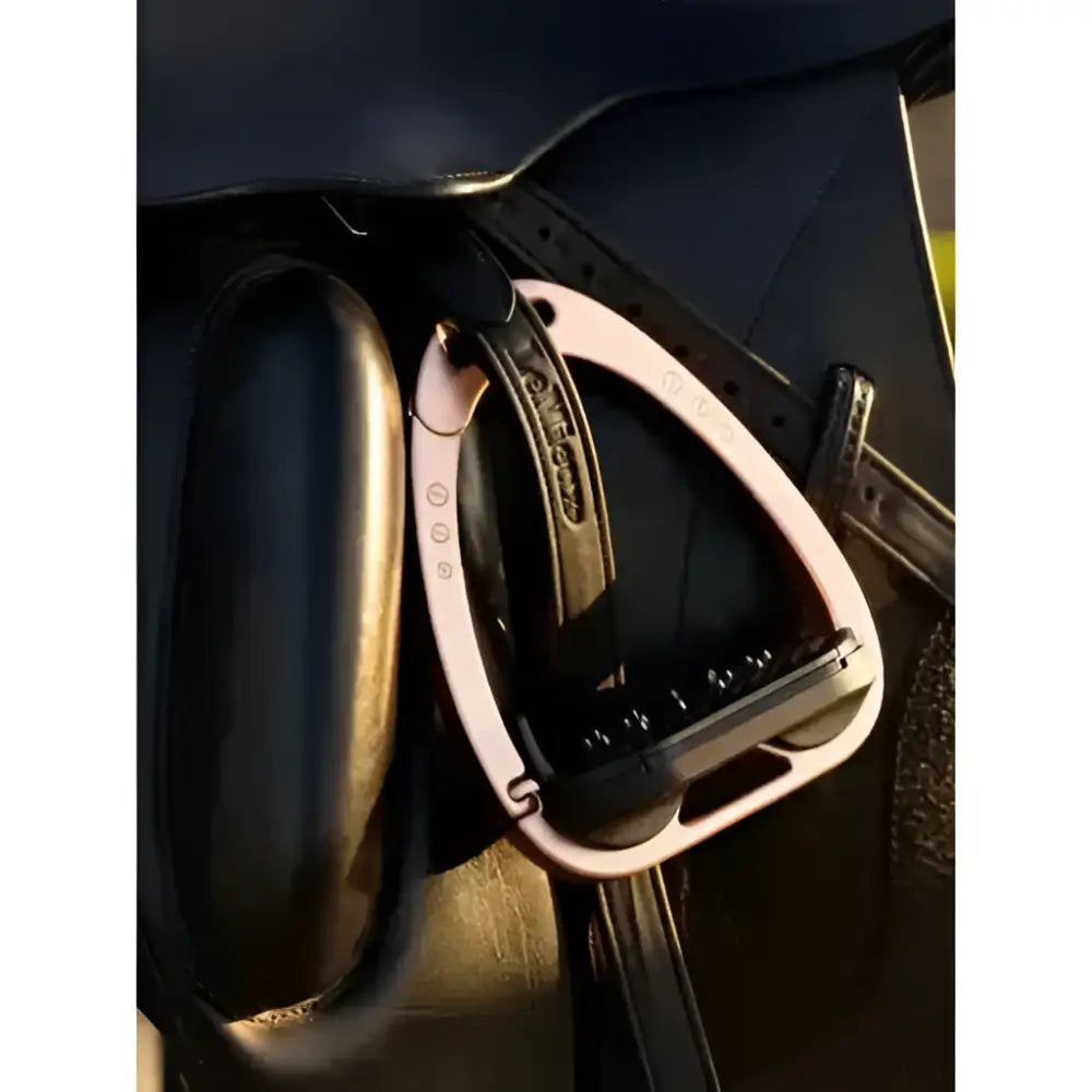 Pink metal lemieux vector control stirrup rose gold with black leather strap and engraved silver logo made from aviation grade aluminium