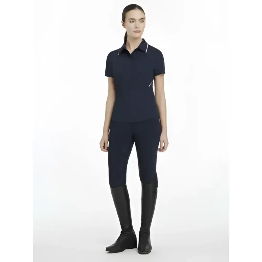 Navy blue lemieux venus performance polo with white trim and subtle diagonal stitching for activewear use