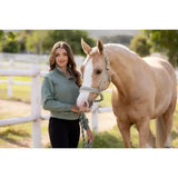 A light green quarter-zip fleece jacket with subtle texture paired with black pants perfect for lemieux versailles headcollar fern fans