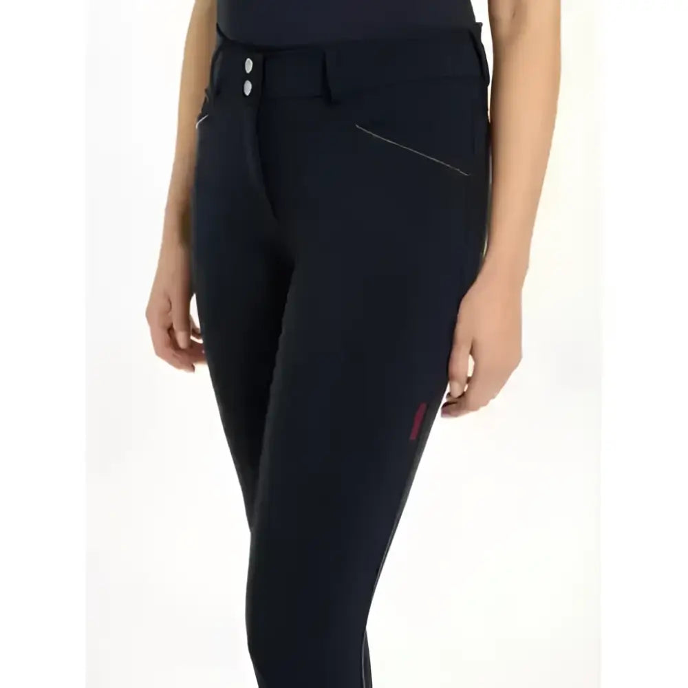 Black lemieux victoria breech riding pants with sleek silicone seat navy and subtle red stitching in a form-fitting design