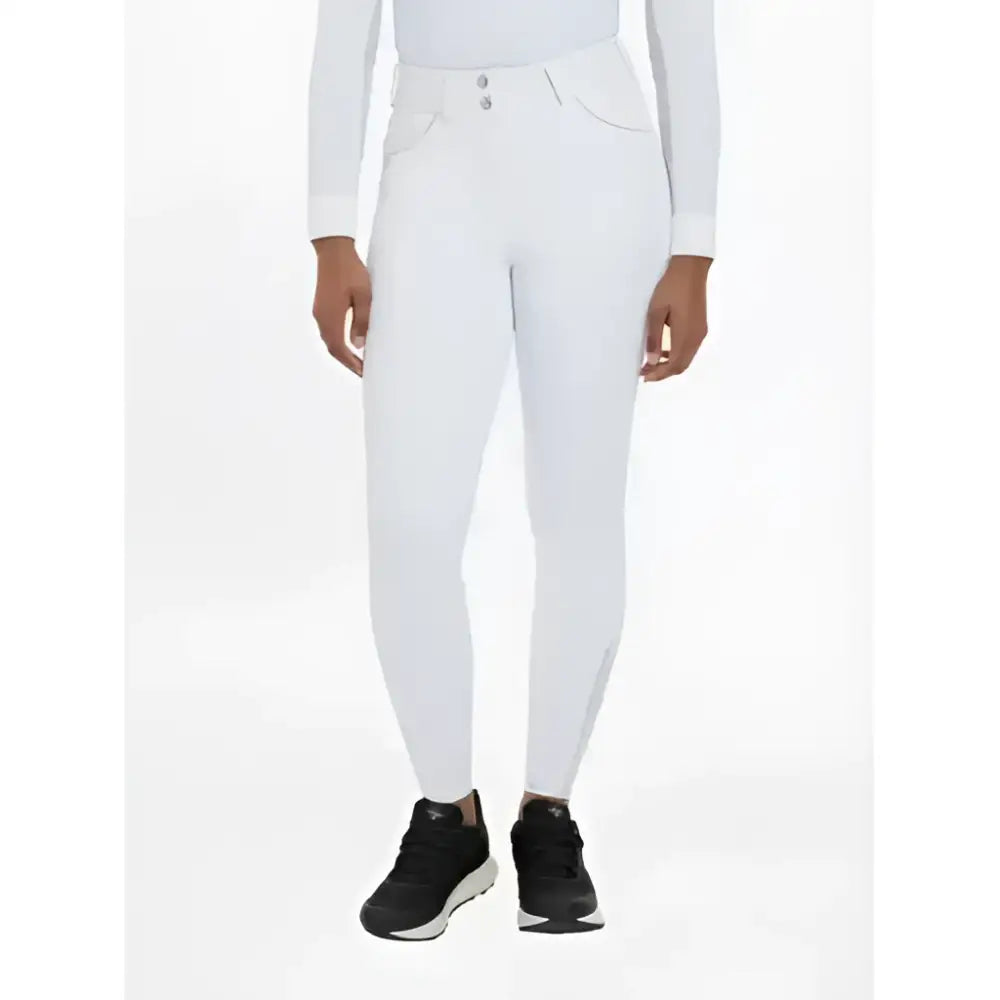 White riding pants with sleek fit and subtle stitching featuring silicone seat white in lemieux victoria breech design