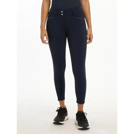 Navy blue high waisted lemieux victoria breech leggings with two front pockets and victoria breech suede seat navy details