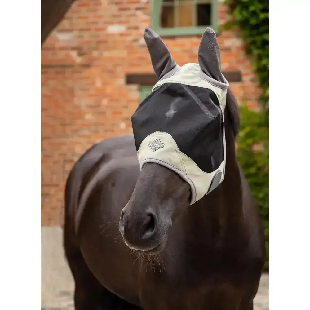 Black and cream lemieux visor-tek half fly mask fern with mesh design and equine brand logo on the side