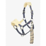 Navy blue and cream lemieux vogue headcollar with padded poll strap, metal buckles, and braided leadrope mimosa attached