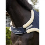 Navy blue lemieux walker rug with cream fleece trim and branded strap designed for maximum stride length