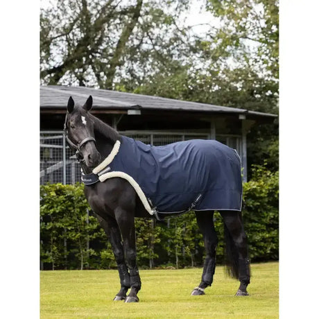Navy blue lemieux walker rug with white fleece trim and black adjustable straps for maximum stride length
