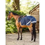 Navy lemieux waterproof exercise quarter sheet with cosy fleece lining and white trim on chestnut horse with saddle