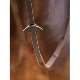 A sleek silver metal chain with a minimalist triangular pendant on lemieux webbed continential reins brown silver