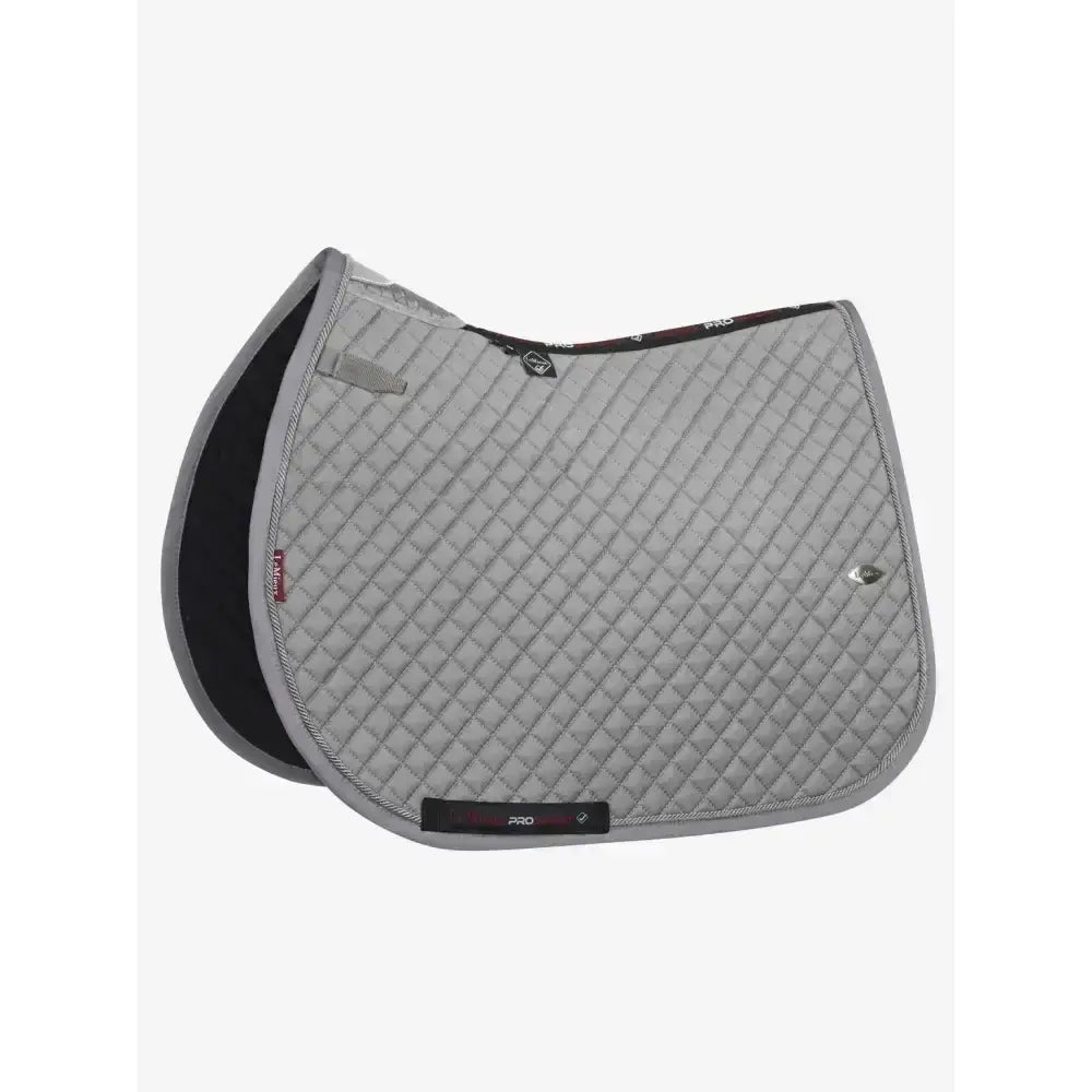 Gray quilted leptmieux wither relief jump pad with black underside and stitched diamond pattern featuring carbon mesh spine