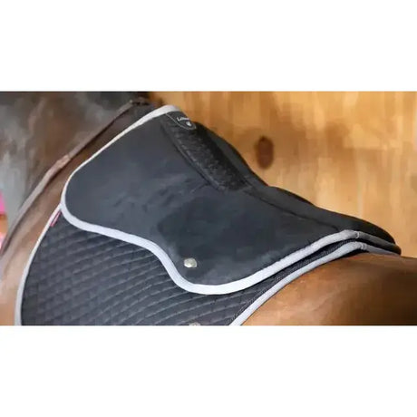 Black lemieux wither relief memory foam half pad with white trim quilted texture and small logo on upper flap