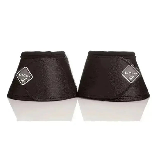 Black lemieux wrap round leather over reach boots with textured finish and diamond-shaped brand logo reach boots black