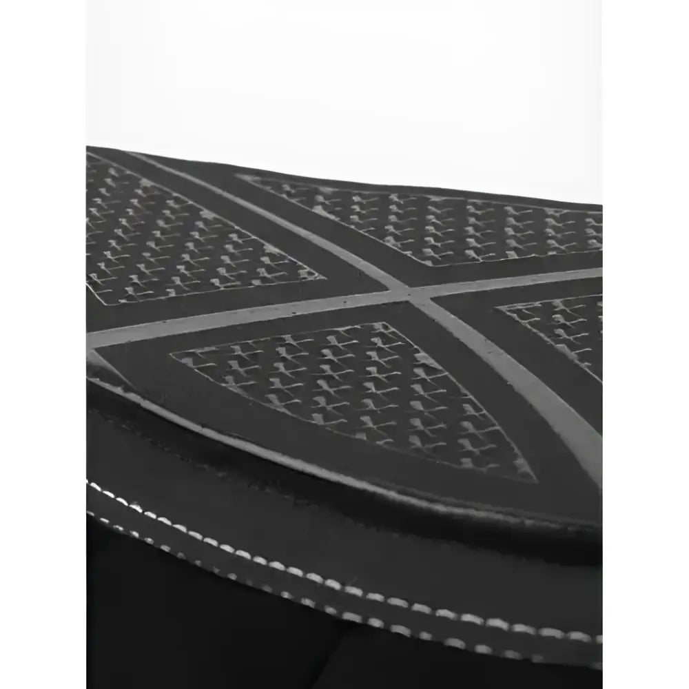 Black rubber sole of lemieux x-grip silicone half pad in iconic lemieux cut with textured houndstooth pattern and white stitching