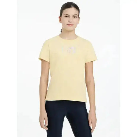 A pale yellow lemieux young rider arianna t-shirt with a subtle signature lemieux autograph hot fix silver logo
