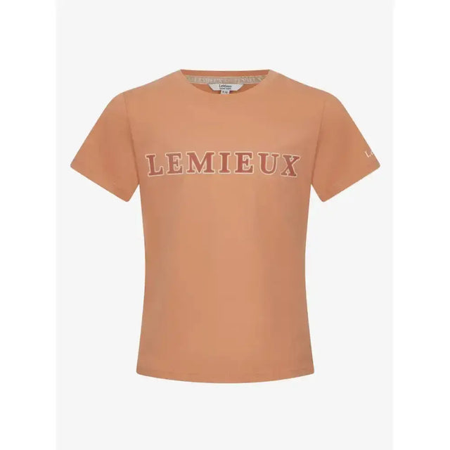 A soft peach cotton young rider arianna t-shirt sherbet with matching lemieux logo across the chest
