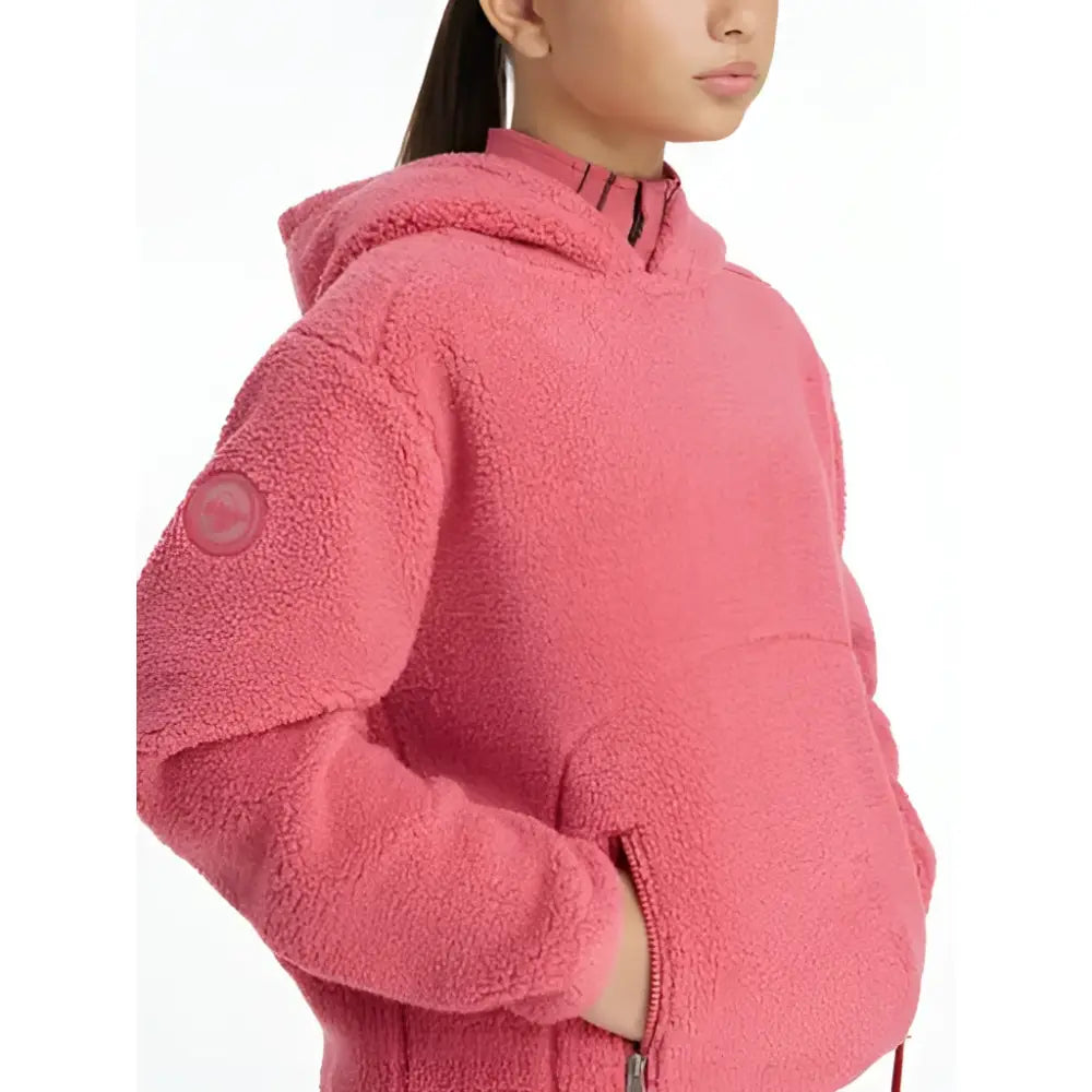 Lemieux young rider avalon hoodie cranberry is a pink sherpa-lined hooded jacket with a subtle circular logo patch on the sleeve