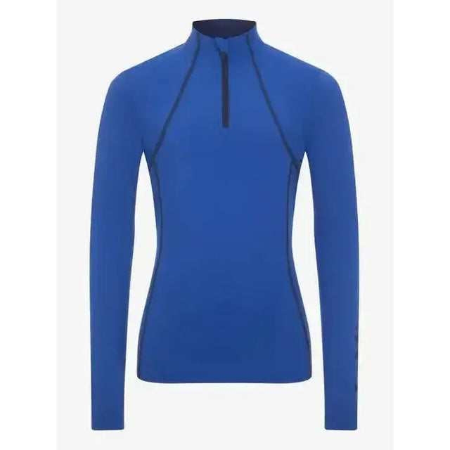 A vibrant royal blue lemieux young rider base layer with quarter zip and flat-lock stitching to reduce chafing