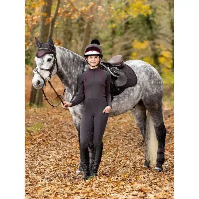 Black lemieux young rider base layer cinder with subtle red trim and high collar for comfortable riding
