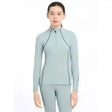 Light blue lemieux young rider base layer glacier with black seams and a half-zip collar for active use