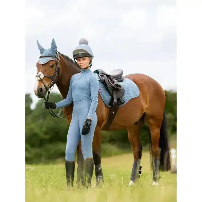 Light blue lemieux young rider base layer ice full body suit with long sleeves and matching gloves for riders