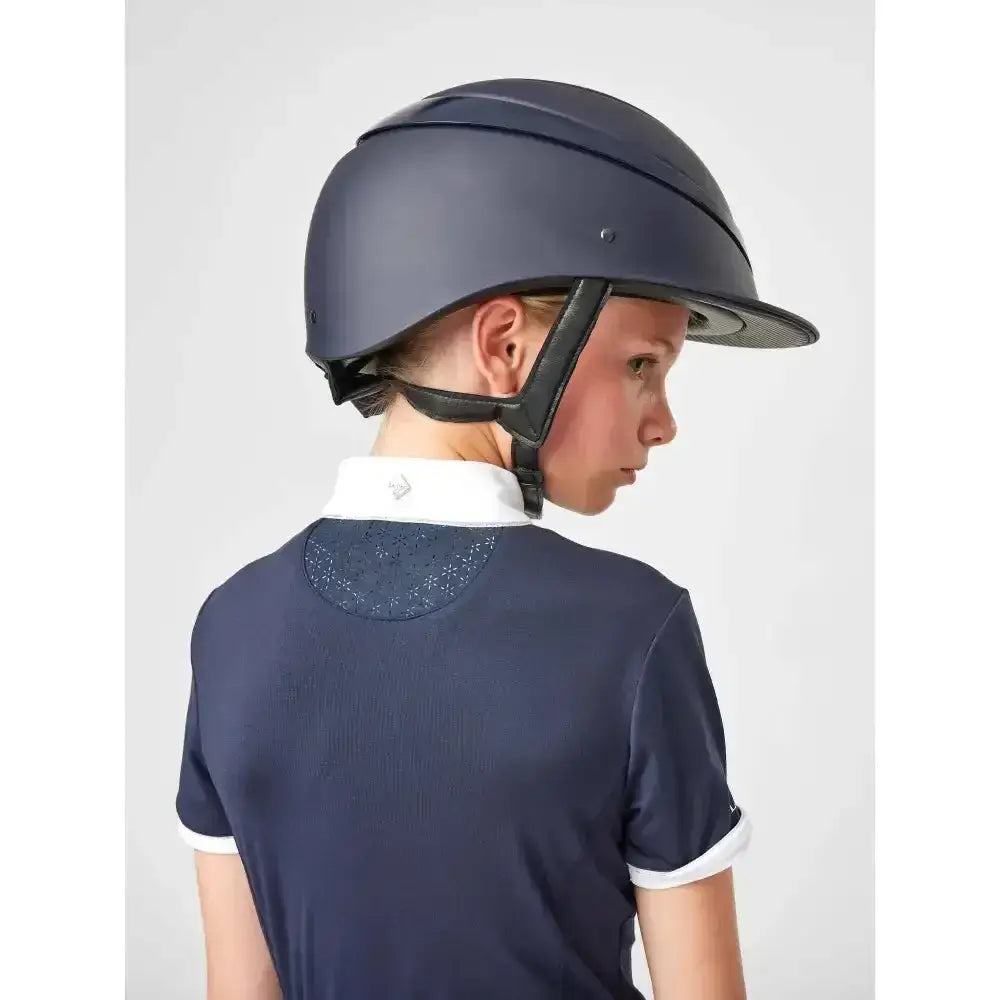 Navy blue lemieux young rider equestrian helmet with black adjustable straps and sleek luxurious super soft design