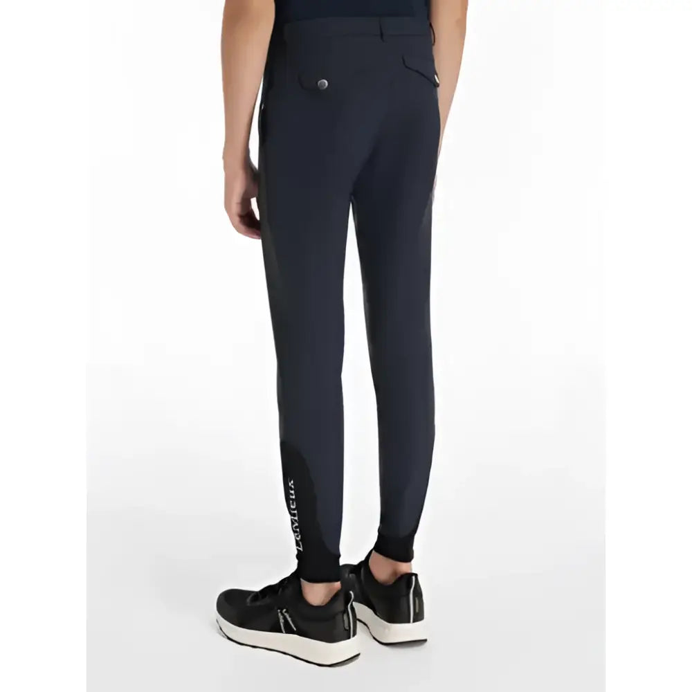 Dark navy lemieux young rider boys classique breeches with sleek fit and subtle branding along lower leg
