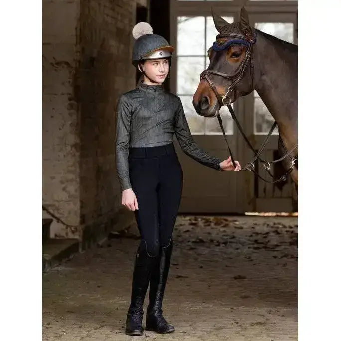 Dark gray long-sleeved lemieux young rider casey base layer alpine top with subtle texture and high neckline