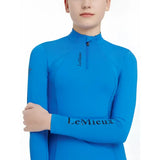 Bright blue lemieux young rider long-sleeved performance top with half-zip collar benetton layer blue